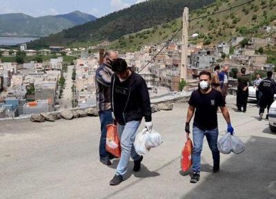 دیدار پرویز پرستوئی و قهرمانان کشتی با کولبران شهرستان مریوان